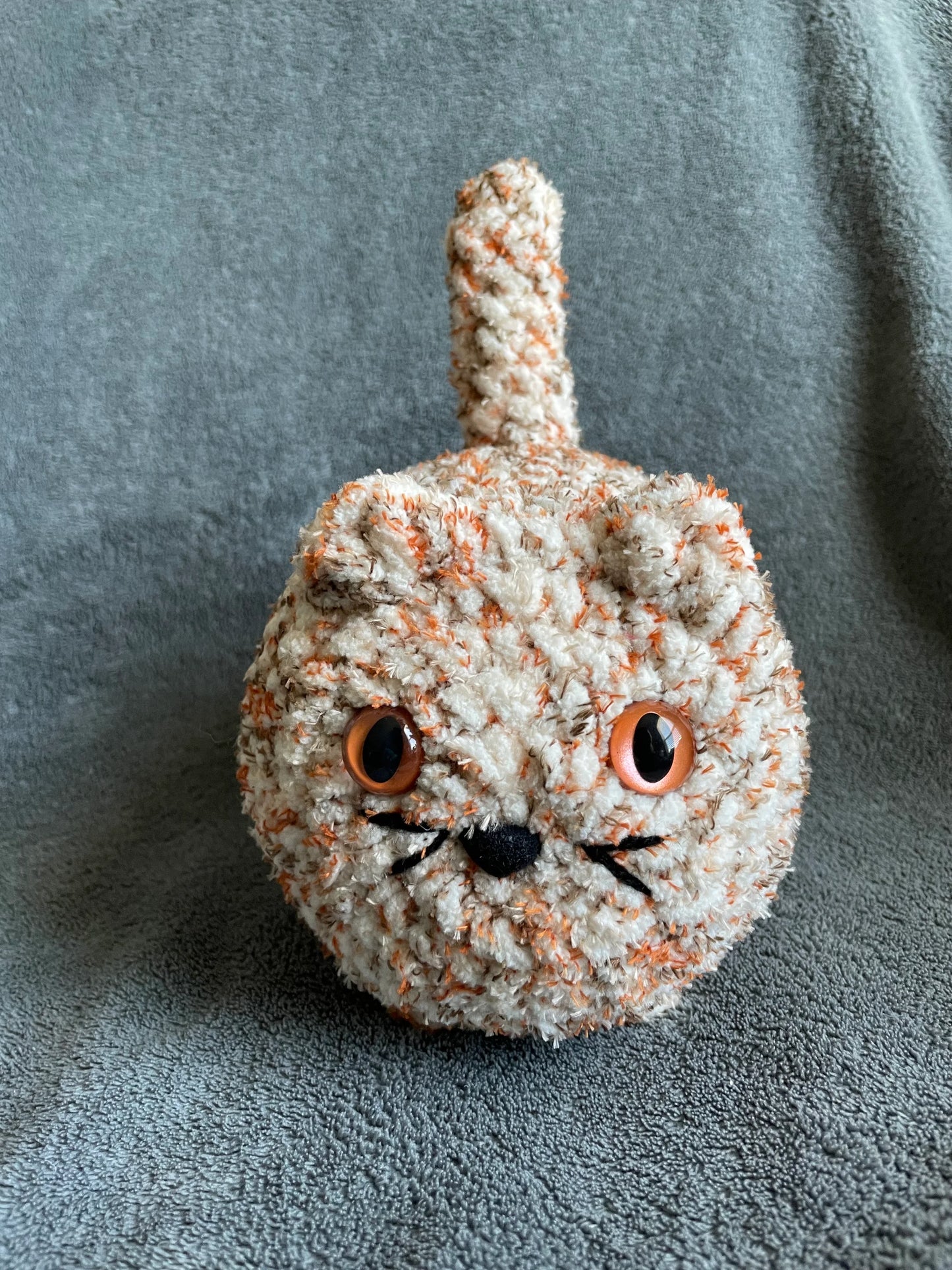 Speckled Orange and Cream Loaf Cat with Amber Eyes