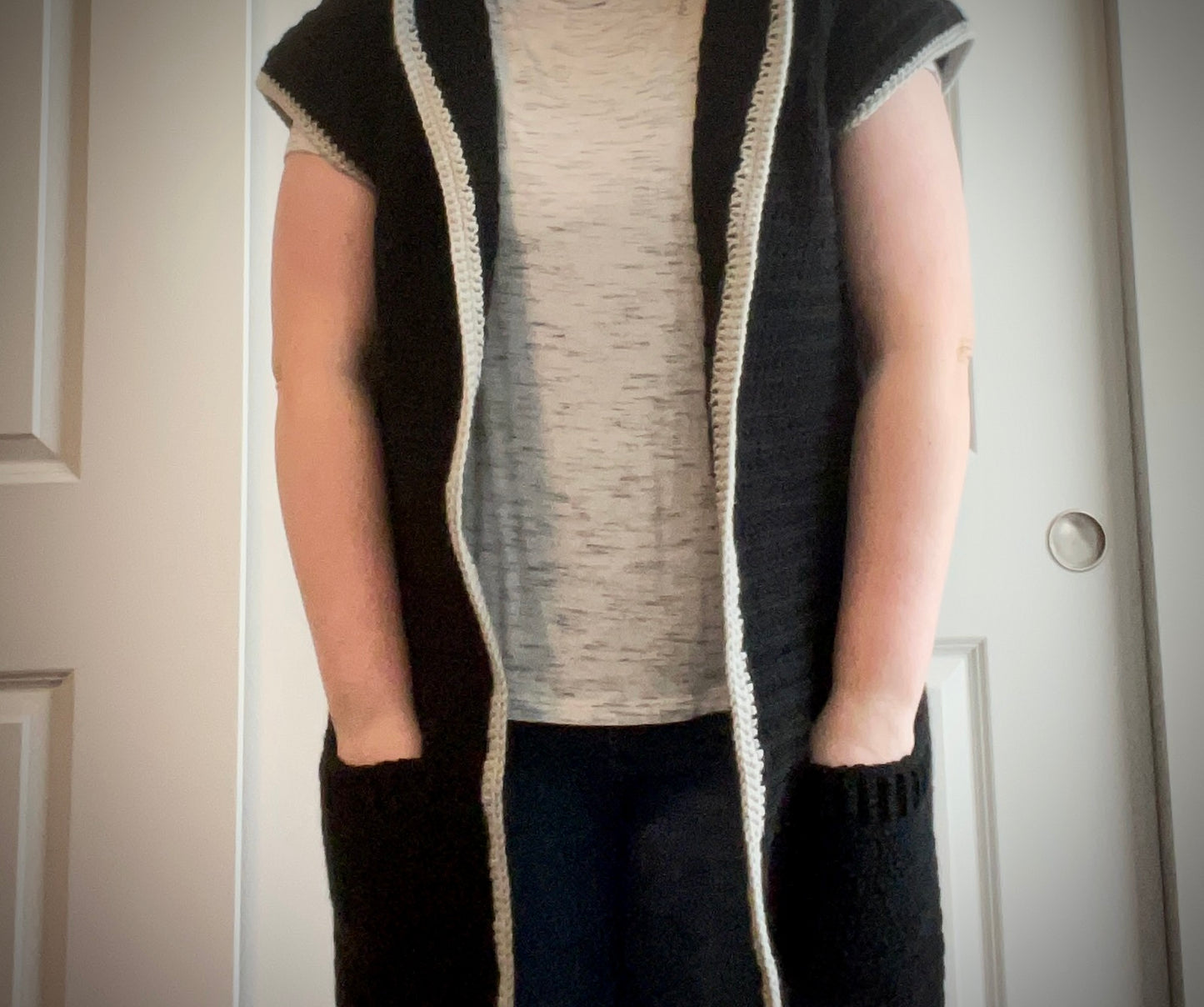 “That’s an assumption.” Long, Hooded, Sleeveless Cardigan/Vest (Black and Silver)