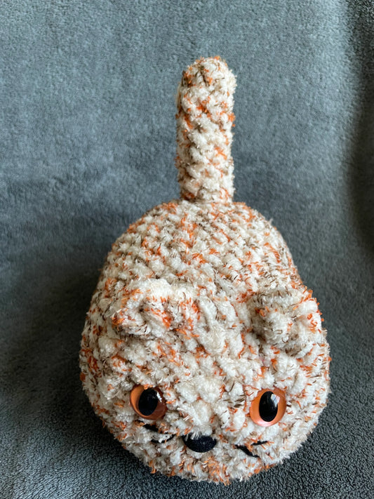 Speckled Orange and Cream Loaf Cat with Amber Eyes