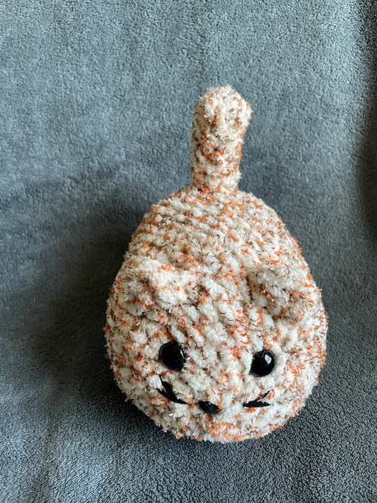 Speckled Orange and Cream Loaf Cat with Black Eyes