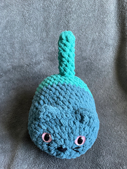 Teal and Turquoise Loaf Cat with Light Pink Eyes
